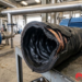 ¿La manguera con espiral de cobre es resistente a la succión por vacío absoluto en sistemas de evacuación de gases de refinerías?